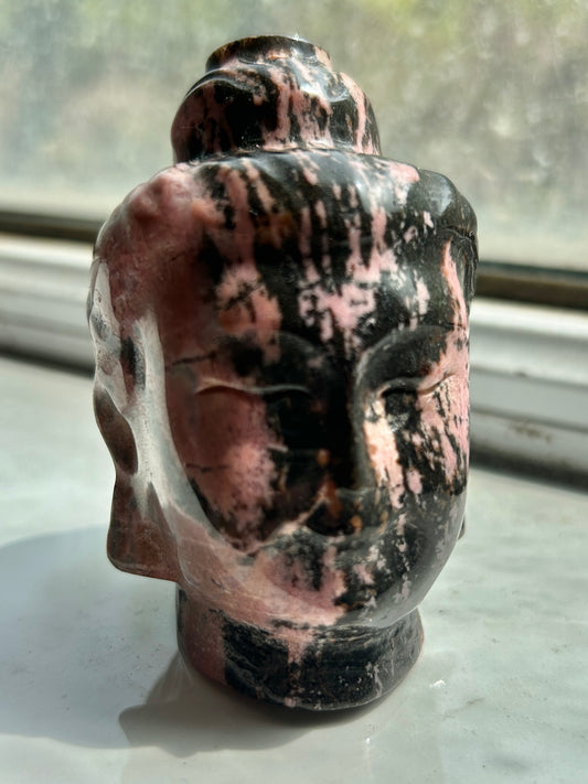 Rhodonite buddha head